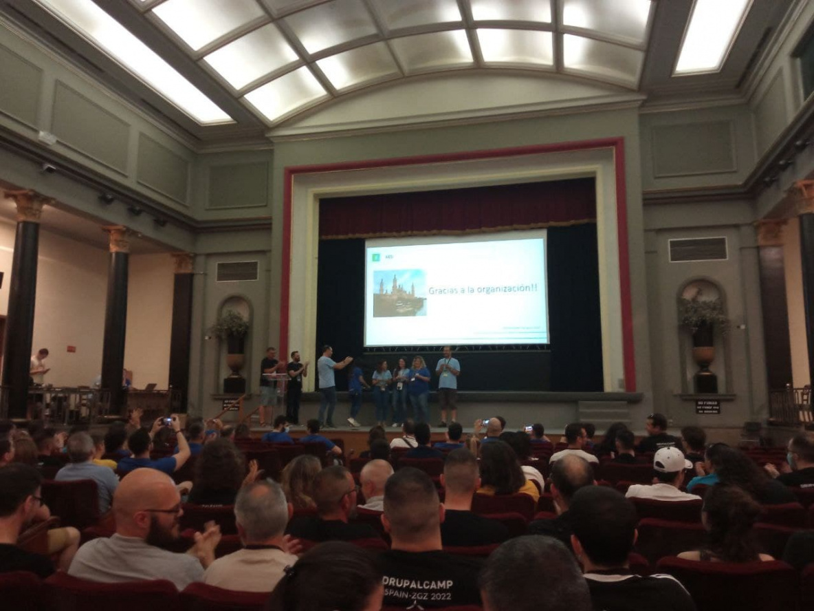 Photo of the inside of the lecture hall at the end of a presentation